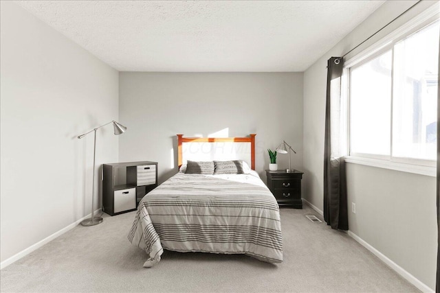 2361 Mccauley Ct, Columbus, OH 43220 - bedroom featuring light colored carpet and a textured ceiling