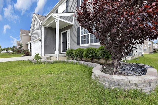 7142 Duke Dr, Canal Winchester, OH 43110 - view of front facade with a front lawn, a garage, and driveway