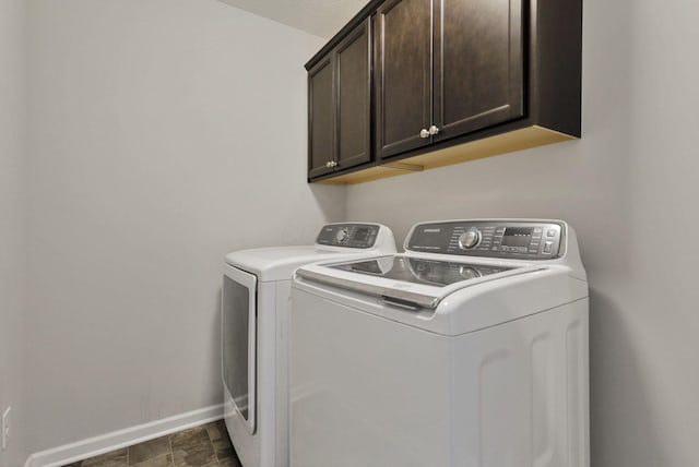 7142 Duke Dr, Canal Winchester, OH 43110 - laundry room with cabinet space, independent washer and dryer, and baseboards