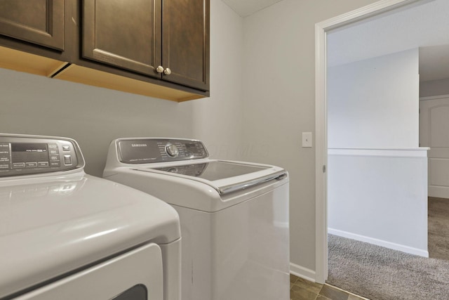 7142 Duke Dr, Canal Winchester, OH 43110 - laundry area featuring washing machine and clothes dryer, cabinet space, carpet floors, and baseboards