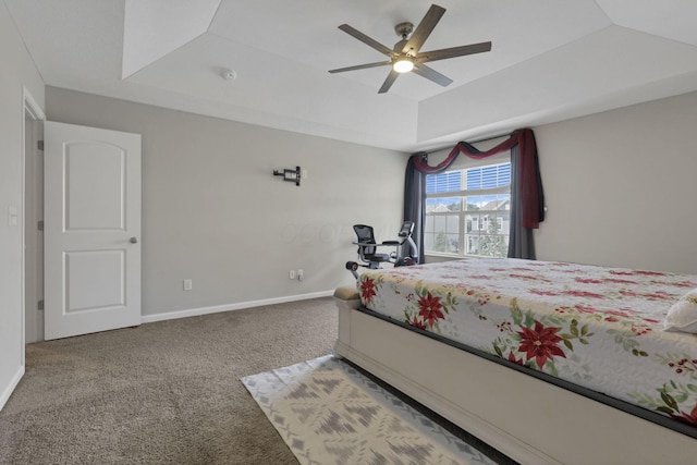 7142 Duke Dr, Canal Winchester, OH 43110 - bedroom featuring carpet flooring, a tray ceiling, baseboards, and a ceiling fan