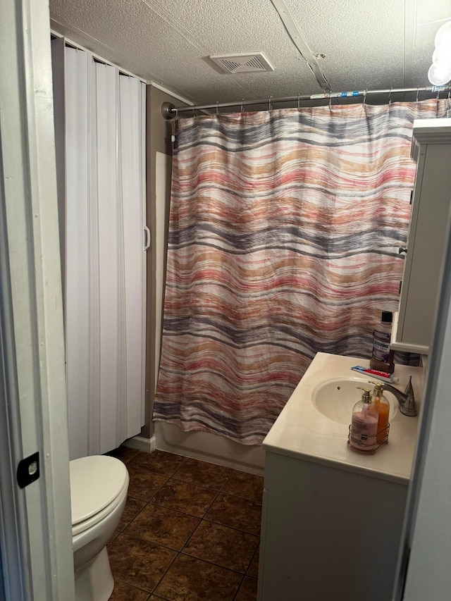 1049 Harmon Ave Lot B27, Columbus, OH 43223 - full bath featuring toilet, vanity, shower / bath combo with shower curtain, and tile patterned floors