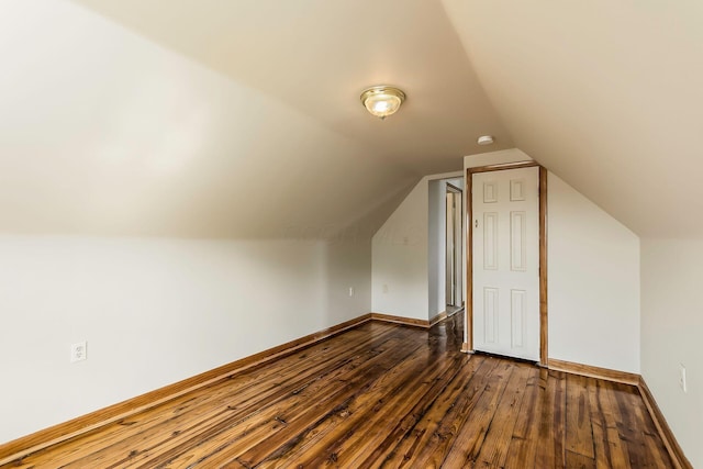 471 Southwood Ave, Columbus, OH 43207 - additional living space featuring dark wood finished floors, lofted ceiling, and baseboards