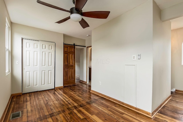 471 Southwood Ave, Columbus, OH 43207 - unfurnished bedroom featuring dark wood-style flooring, baseboards, and a closet