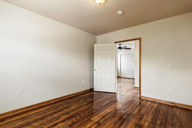 471 Southwood Ave, Columbus, OH 43207 - spare room featuring baseboards, dark wood-type flooring, and a smoke detector