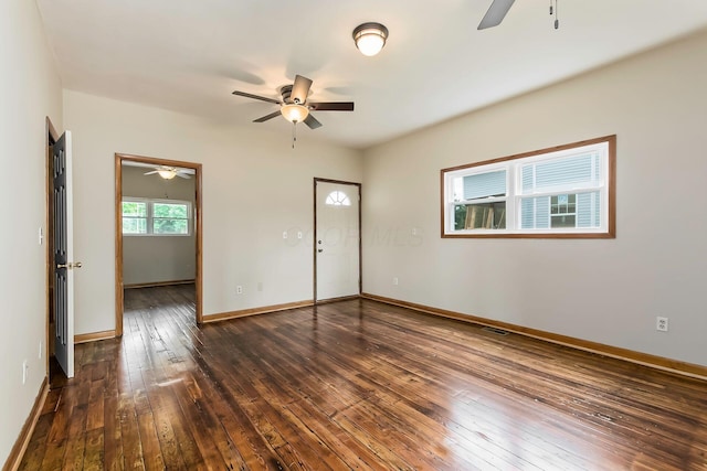 471 Southwood Ave, Columbus, OH 43207 - empty room with ceiling fan, dark wood-style floors, and baseboards