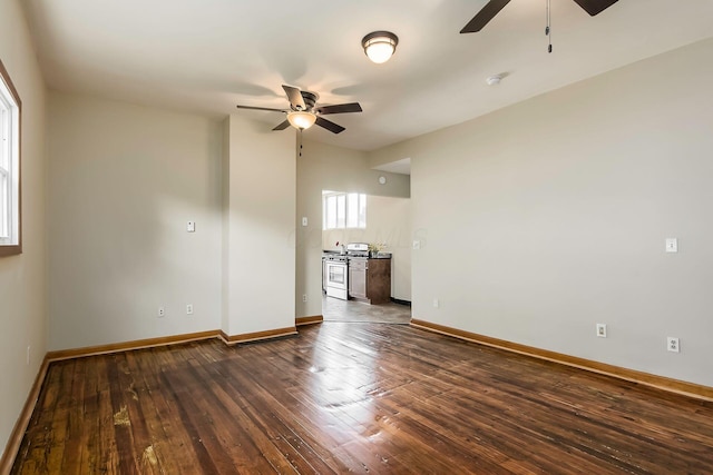 471 Southwood Ave, Columbus, OH 43207 - empty room with ceiling fan, dark wood-type flooring, baseboards, and a smoke detector