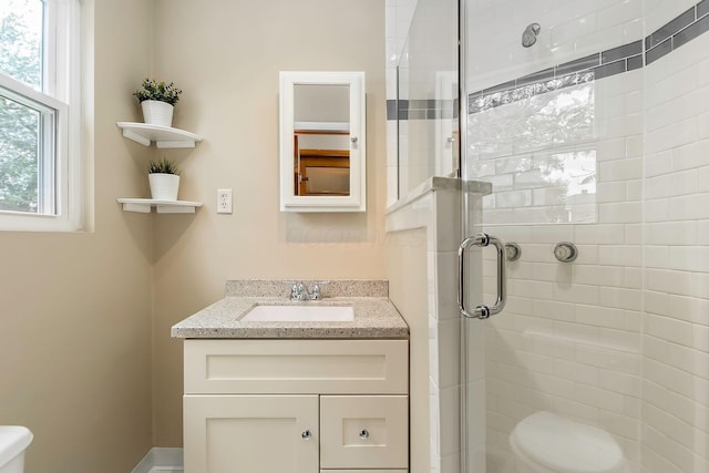 471 Southwood Ave, Columbus, OH 43207 - bathroom with toilet, a stall shower, and vanity