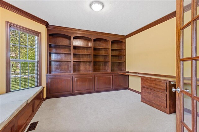 3144 Abbey Knoll Dr, Lewis Center, OH 43035 - unfurnished office featuring crown molding, light colored carpet, and built in desk
