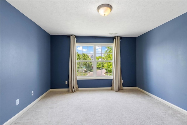 3144 Abbey Knoll Dr, Lewis Center, OH 43035 - carpeted spare room with a textured ceiling and baseboards