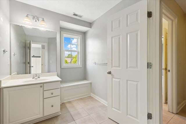 3144 Abbey Knoll Dr, Lewis Center, OH 43035 - bathroom with tile patterned flooring, vanity, and baseboards