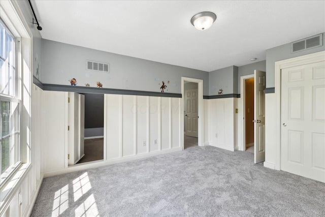 3144 Abbey Knoll Dr, Lewis Center, OH 43035 - unfurnished bedroom with multiple windows and carpet