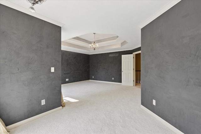 3144 Abbey Knoll Dr, Lewis Center, OH 43035 - carpeted spare room featuring a chandelier, a tray ceiling, crown molding, and baseboards
