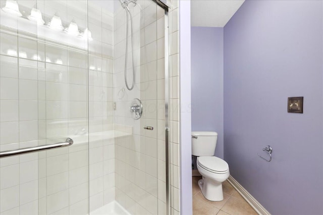 3144 Abbey Knoll Dr, Lewis Center, OH 43035 - bathroom featuring a stall shower, toilet, and tile patterned flooring