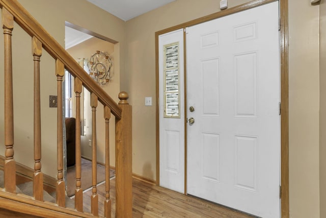 6792 Makady Rd, Canal Winchester, OH 43110 - entryway featuring stairway, light wood-style flooring, and baseboards