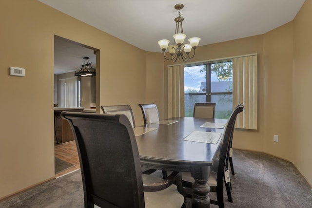 6792 Makady Rd, Canal Winchester, OH 43110 - dining area with a chandelier and carpet floors