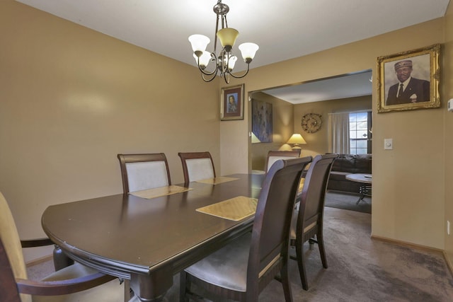 6792 Makady Rd, Canal Winchester, OH 43110 - dining space with a chandelier, carpet flooring, and baseboards