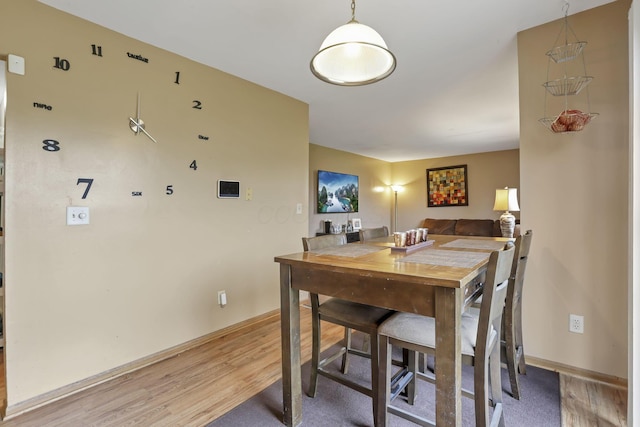 6792 Makady Rd, Canal Winchester, OH 43110 - dining room featuring light wood-style floors and baseboards