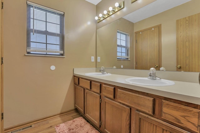 6792 Makady Rd, Canal Winchester, OH 43110 - full bath featuring double vanity and wood finished floors