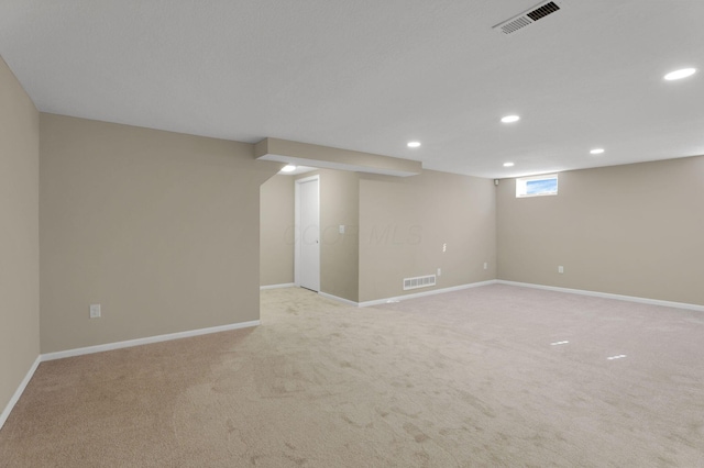 1722 Rock Creek Dr, Grove City, OH 43123 - below grade area with light carpet, recessed lighting, and baseboards