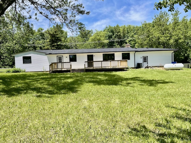 1071 US-42, London, OH 43140 - manufactured / mobile home featuring a deck, a front lawn, and a chimney