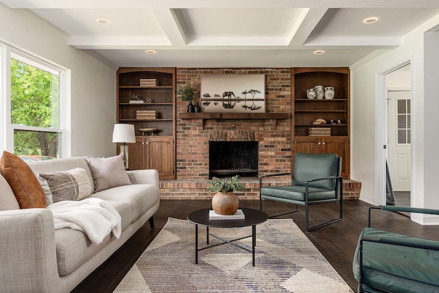 1071 US-42, London, OH 43140 - living room with coffered ceiling, built in features, dark wood finished floors, a fireplace, and beamed ceiling