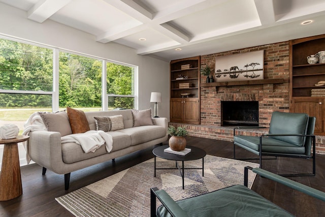1071 US-42, London, OH 43140 - living room with built in shelves, wood finished floors, coffered ceiling, beamed ceiling, and a fireplace