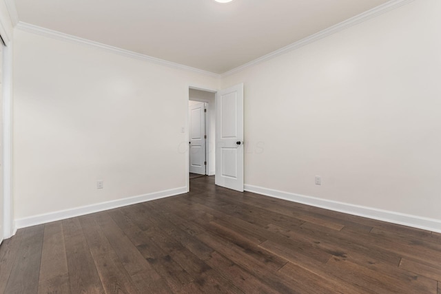 1071 US-42, London, OH 43140 - unfurnished room with crown molding, baseboards, and dark wood-style floors