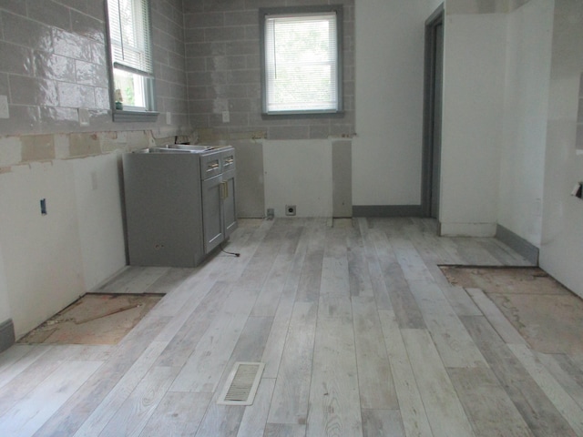 1056 Geers Ave, Columbus, OH 43206 - kitchen with light wood-style flooring and a sink