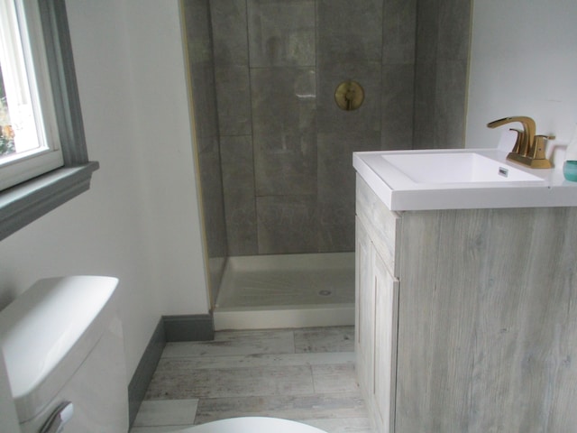 1056 Geers Ave, Columbus, OH 43206 - bathroom with toilet, a shower stall, and vanity