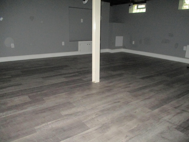 1056 Geers Ave, Columbus, OH 43206 - below grade area with dark wood-style floors and baseboards