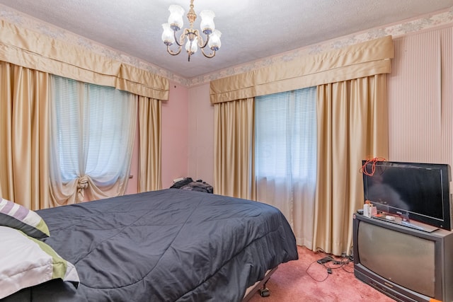 2929 Fairwood Ave, Columbus, OH 43205 - carpeted bedroom with a chandelier and a textured ceiling
