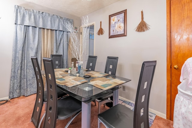2929 Fairwood Ave, Columbus, OH 43205 - dining room with baseboards, a textured ceiling, and carpet
