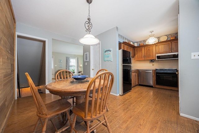 2349 Hardesty Dr N Unit B9, Columbus, OH 43204 - dining space featuring light wood-style flooring
