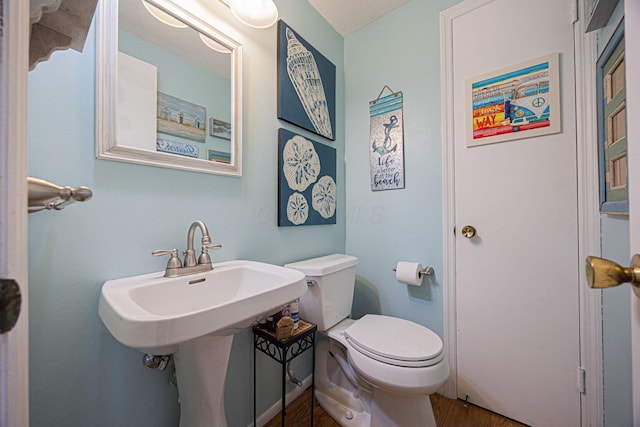 2349 Hardesty Dr N Unit B9, Columbus, OH 43204 - bathroom with toilet and wood finished floors