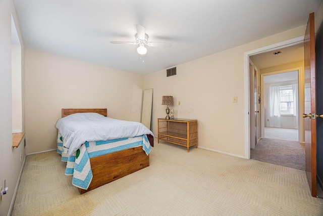 2349 Hardesty Dr N Unit B9, Columbus, OH 43204 - carpeted bedroom featuring a ceiling fan and baseboards
