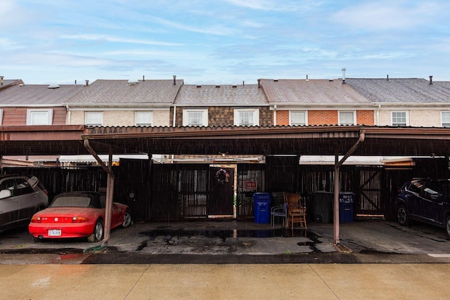 2349 Hardesty Dr N Unit B9, Columbus, OH 43204 - rear view of property featuring covered parking