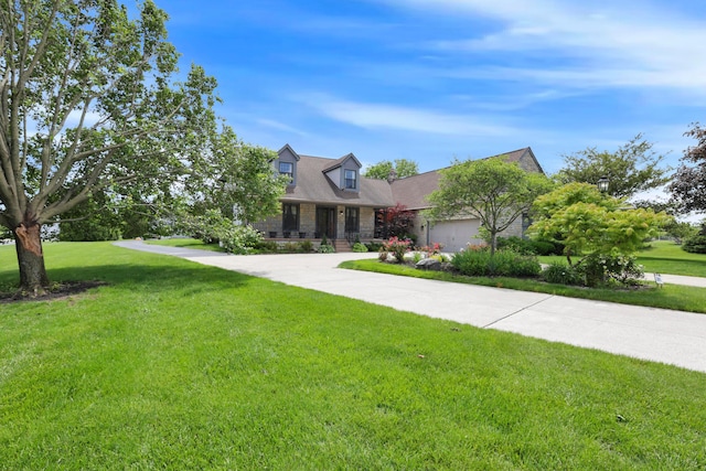 3171 Orders Rd, Grove City, OH 43123 - new england style home featuring a front yard, an attached garage, stone siding, and driveway