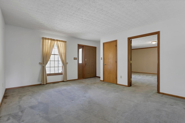 3171 Orders Rd, Grove City, OH 43123 - carpeted empty room with baseboards and a textured ceiling