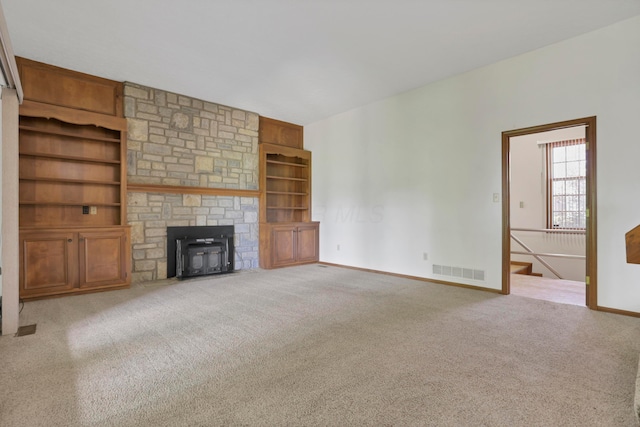 3171 Orders Rd, Grove City, OH 43123 - unfurnished living room featuring carpet, built in shelves, and baseboards