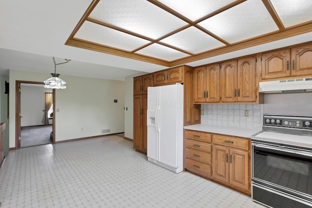 3171 Orders Rd, Grove City, OH 43123 - kitchen with under cabinet range hood, electric stove, white refrigerator with ice dispenser, light countertops, and brown cabinetry