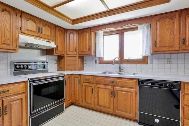 3171 Orders Rd, Grove City, OH 43123 - kitchen featuring under cabinet range hood, dishwasher, range with electric stovetop, a sink, and brown cabinetry