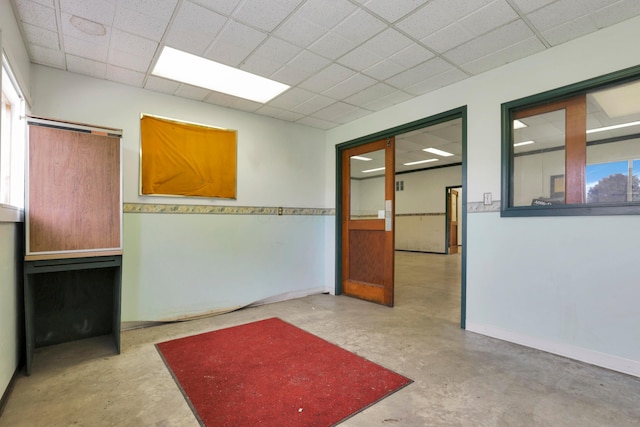 3171 Orders Rd, Grove City, OH 43123 - unfurnished room featuring concrete flooring, a drop ceiling, and baseboards