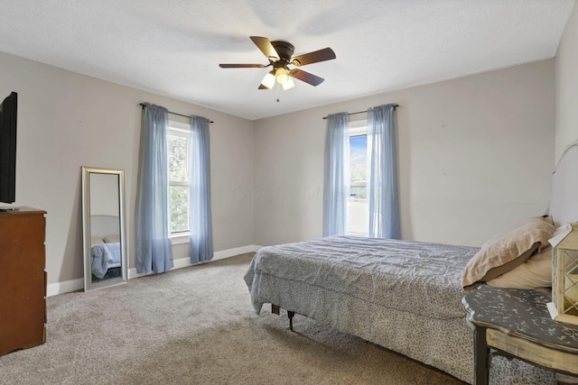 402 W St, Groveport, OH 43125 - bedroom featuring baseboards, carpet floors, and ceiling fan