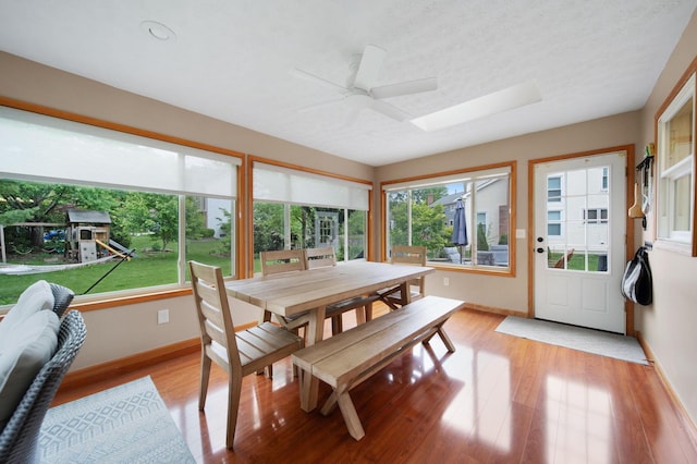 1055 Arcaro Dr, Columbus, OH 43230 - dining space with baseboards, light wood-type flooring, and a ceiling fan