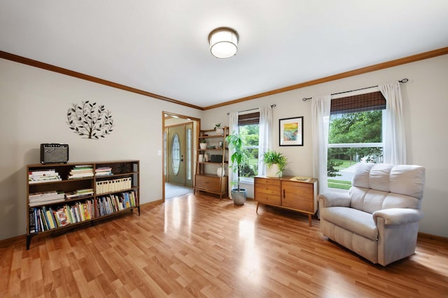 1055 Arcaro Dr, Columbus, OH 43230 - sitting room with light wood-type flooring, ornamental molding, and baseboards