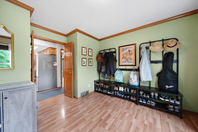 1055 Arcaro Dr, Columbus, OH 43230 - living area featuring light wood-style floors, baseboards, and crown molding