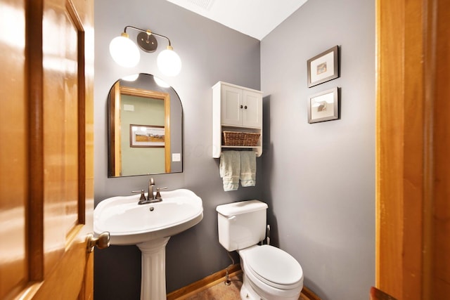 1055 Arcaro Dr, Columbus, OH 43230 - half bathroom featuring toilet and baseboards