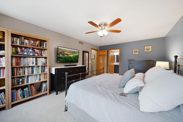 1055 Arcaro Dr, Columbus, OH 43230 - carpeted bedroom featuring connected bathroom and ceiling fan