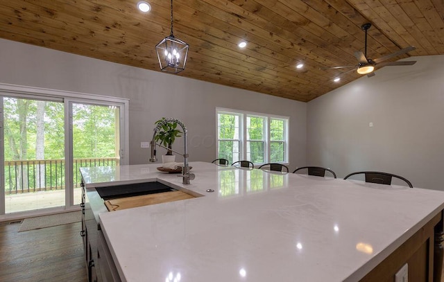 21650 Lake Rd, Glouster, OH 45732 - kitchen with lofted ceiling, wooden ceiling, a ceiling fan, recessed lighting, and pendant lighting